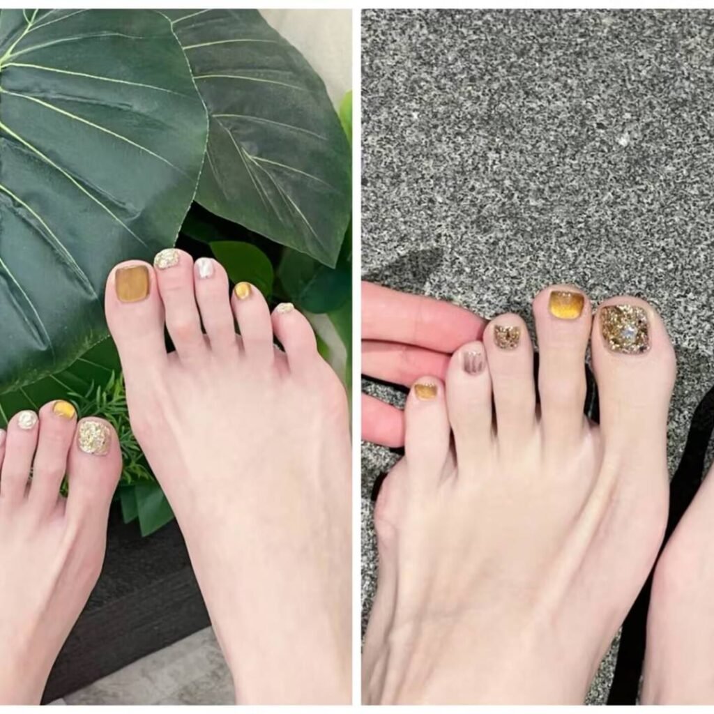 Manicured fair-skinned feet featuring toenails painted in a soft pink shade.