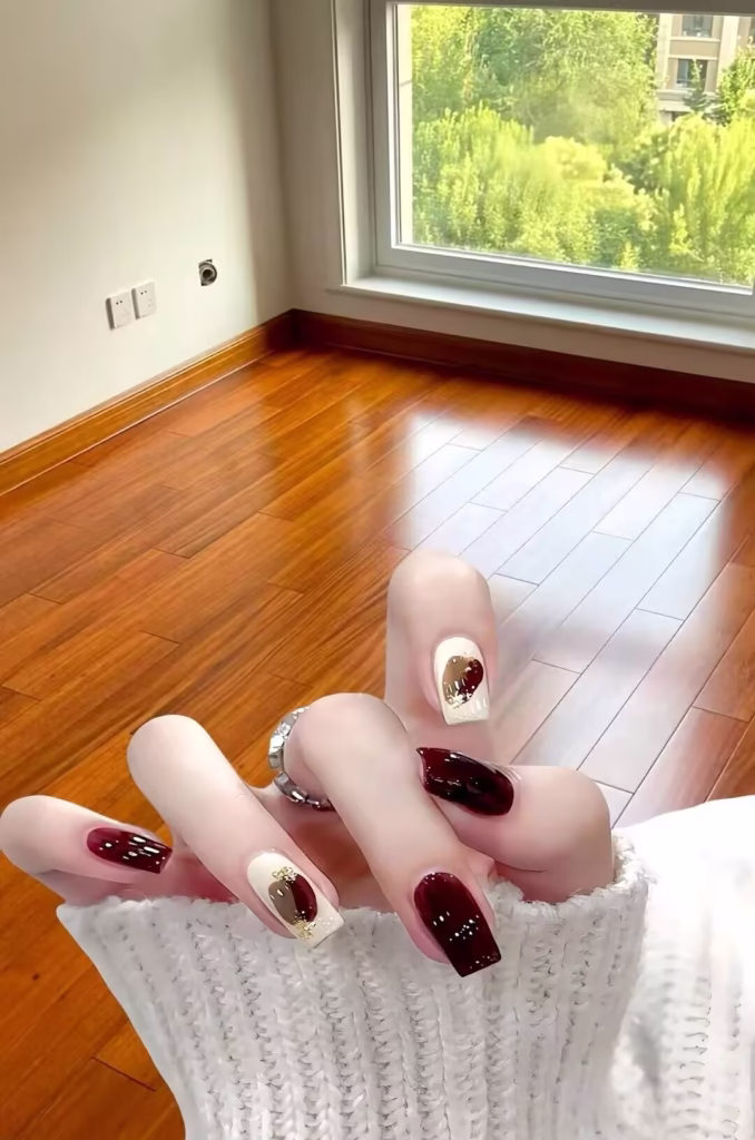 Skin Brightening Manicure Styles featuring pearlized nude polish with delicate glitter tips and subtle chrome accents.