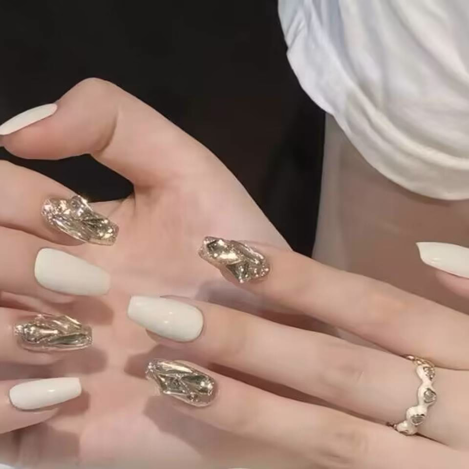 Trending Short Nail Designs: French tip with nude pink base and silver metallic accents