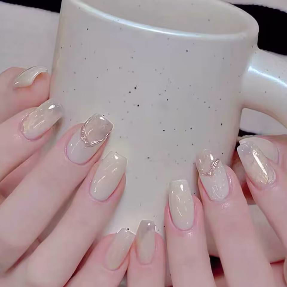 Trending Short Nail Designs: French tip with nude pink base and silver metallic accents
