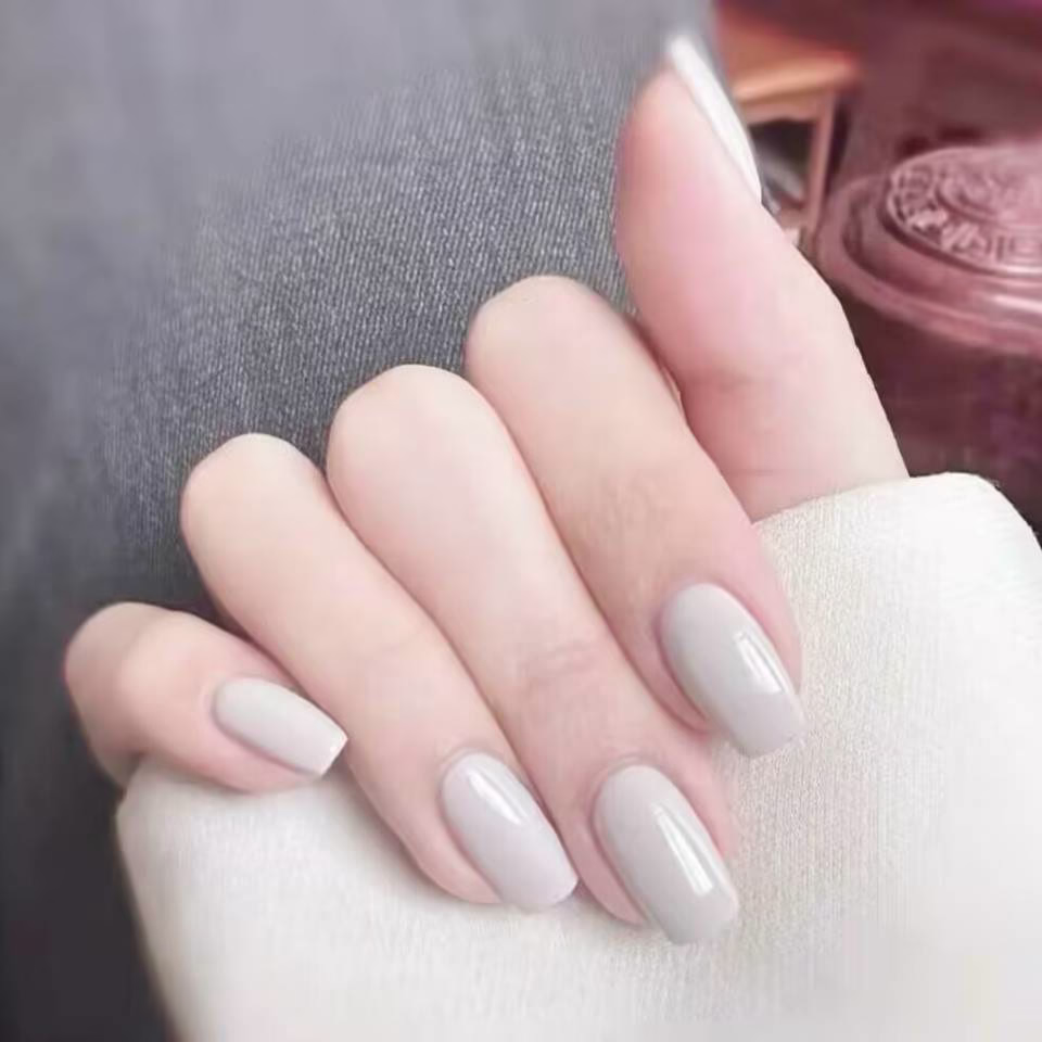 Trending Short Nail Designs: French tip with nude pink base and silver metallic accents