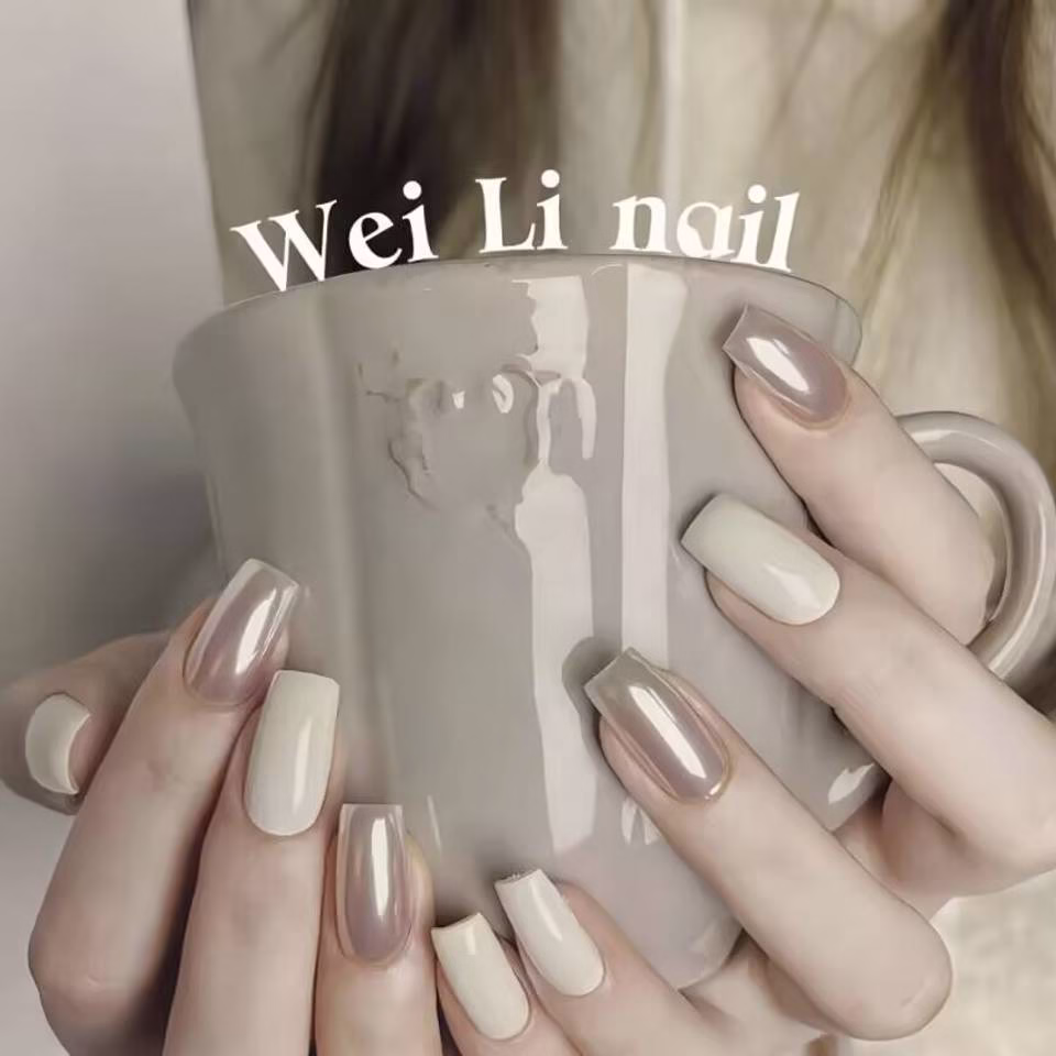 Trending Short Nail Designs: French tip with nude pink base and silver metallic accents