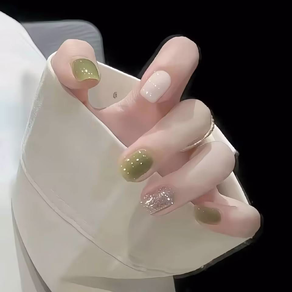 Trending Short Nail Designs: French tip with nude pink base and silver metallic accents
