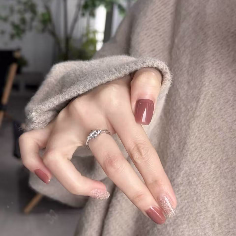 Trending Short Nail Designs: French tip with nude pink base and silver metallic accents