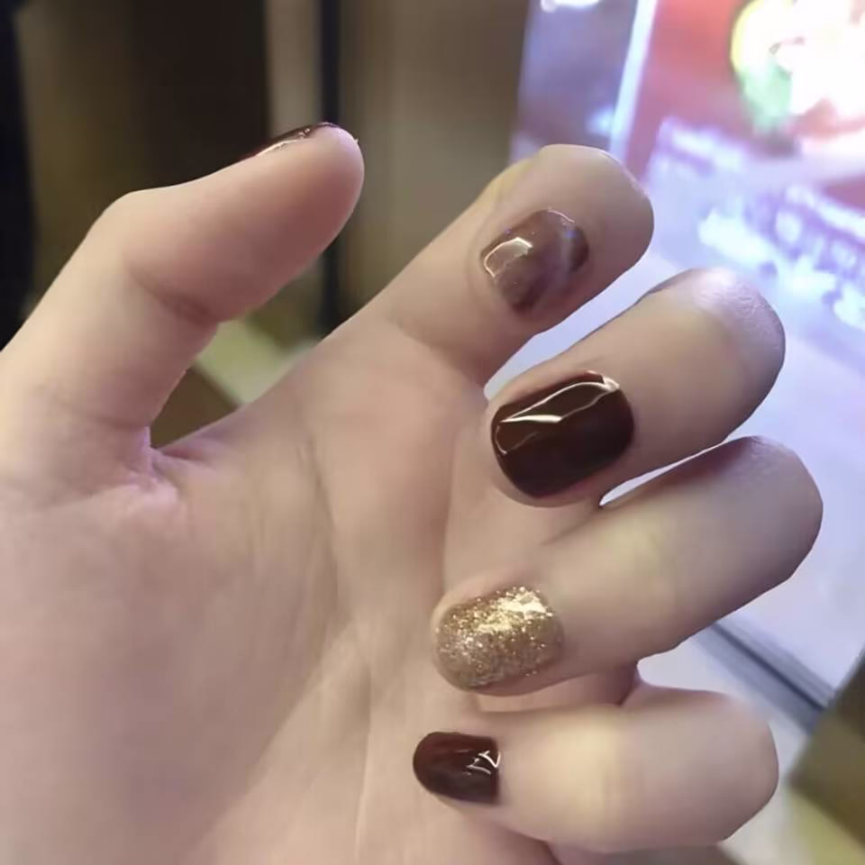 Trending Short Nail Designs: French tip with nude pink base and silver metallic accents